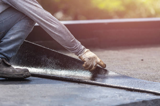 Professional Basement Waterproofing technician working in Redgranite, WI